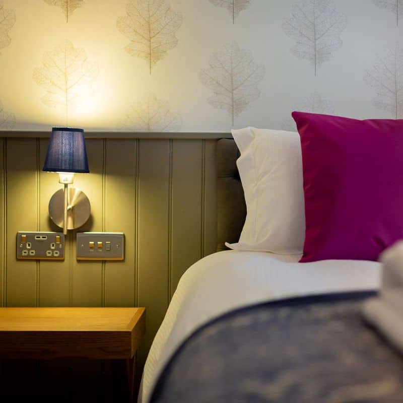 Hotel room bed for a cosy winter stay over Christmas