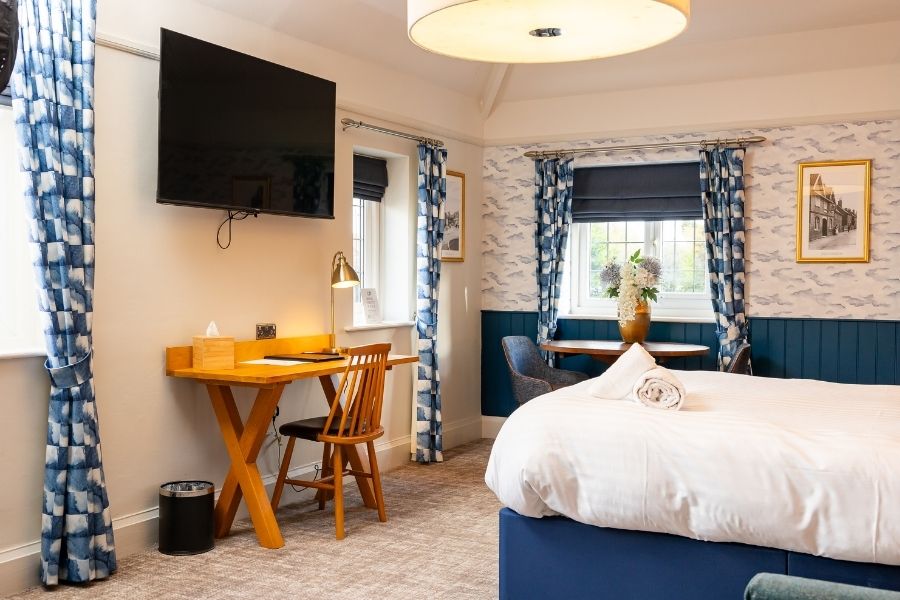 A cosy looking contemporary hotel room at The Chequers